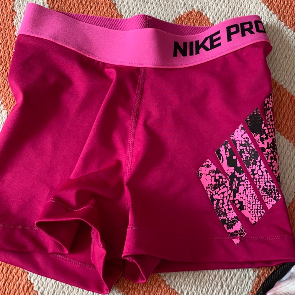Size xs pink nike pros